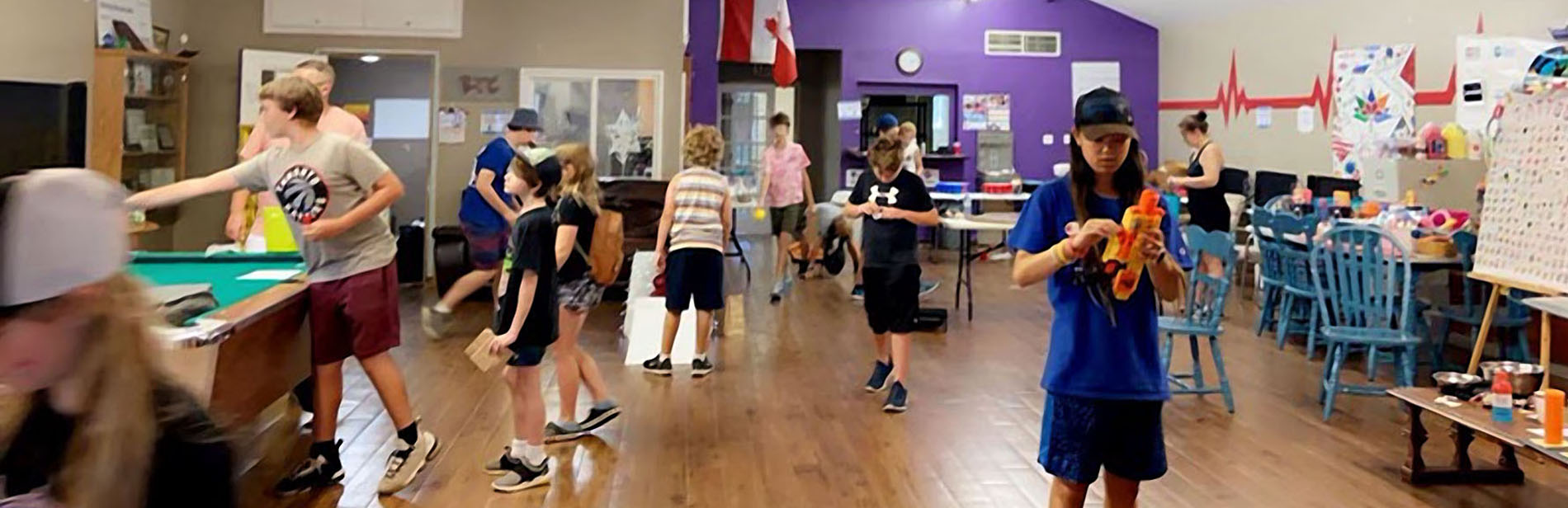 Young people having fun together at the youth centre